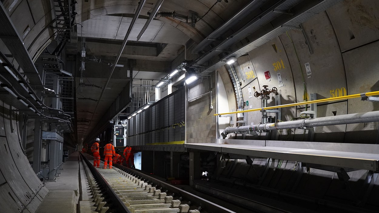 A tunnel at Crossrail in London with construction workers