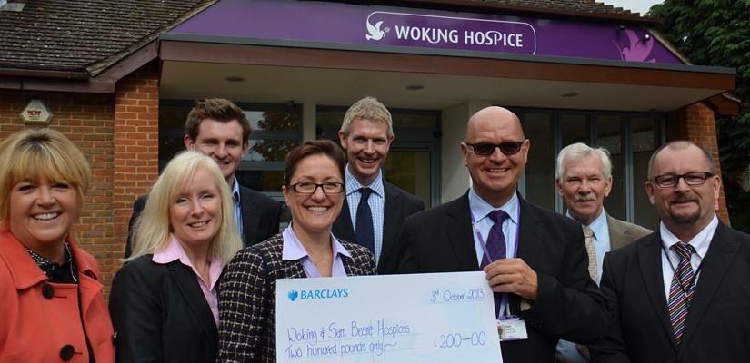 Katy Dowding and Nigel Harding (holding cheque) pictured with the facilities services team Katy Dowding and Nigel Harding (holding cheque) pictured with the facilities services team