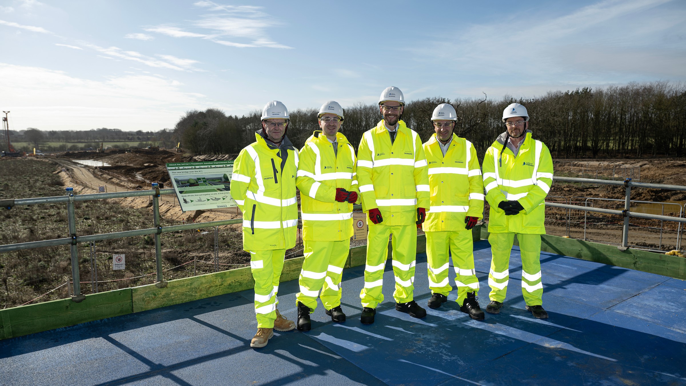 Simon Lightwood MP (centre) with James Corker (left) and other attendees