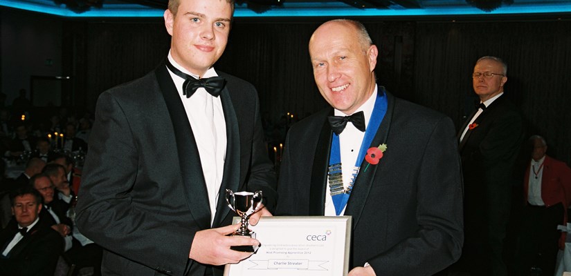 John Breheny, Chairman of CECA (Southern) presents Charlie Streater with his award John Breheny, Chairman of CECA (Southern) presents Charlie Streater with his award