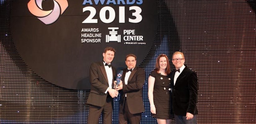 David Mason and Becki Taylor collecting award David Mason and Becki Taylor collecting award