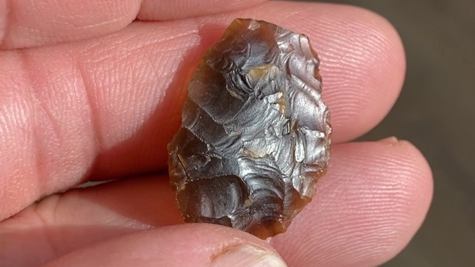 Neolithic leaf-shaped arrowhead. Credit: National Highways & AMS