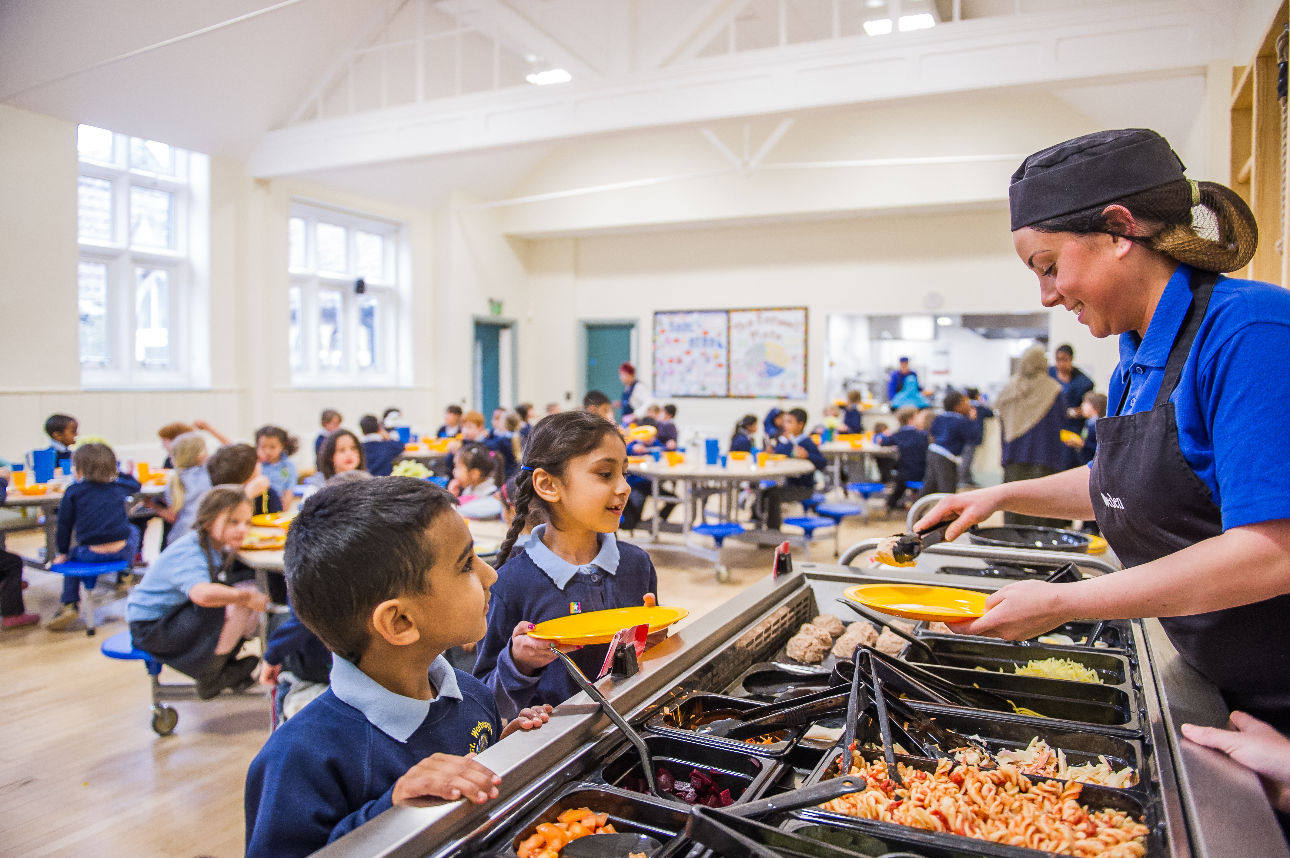 Lunchtime in the new hall at St Werburghs Primary