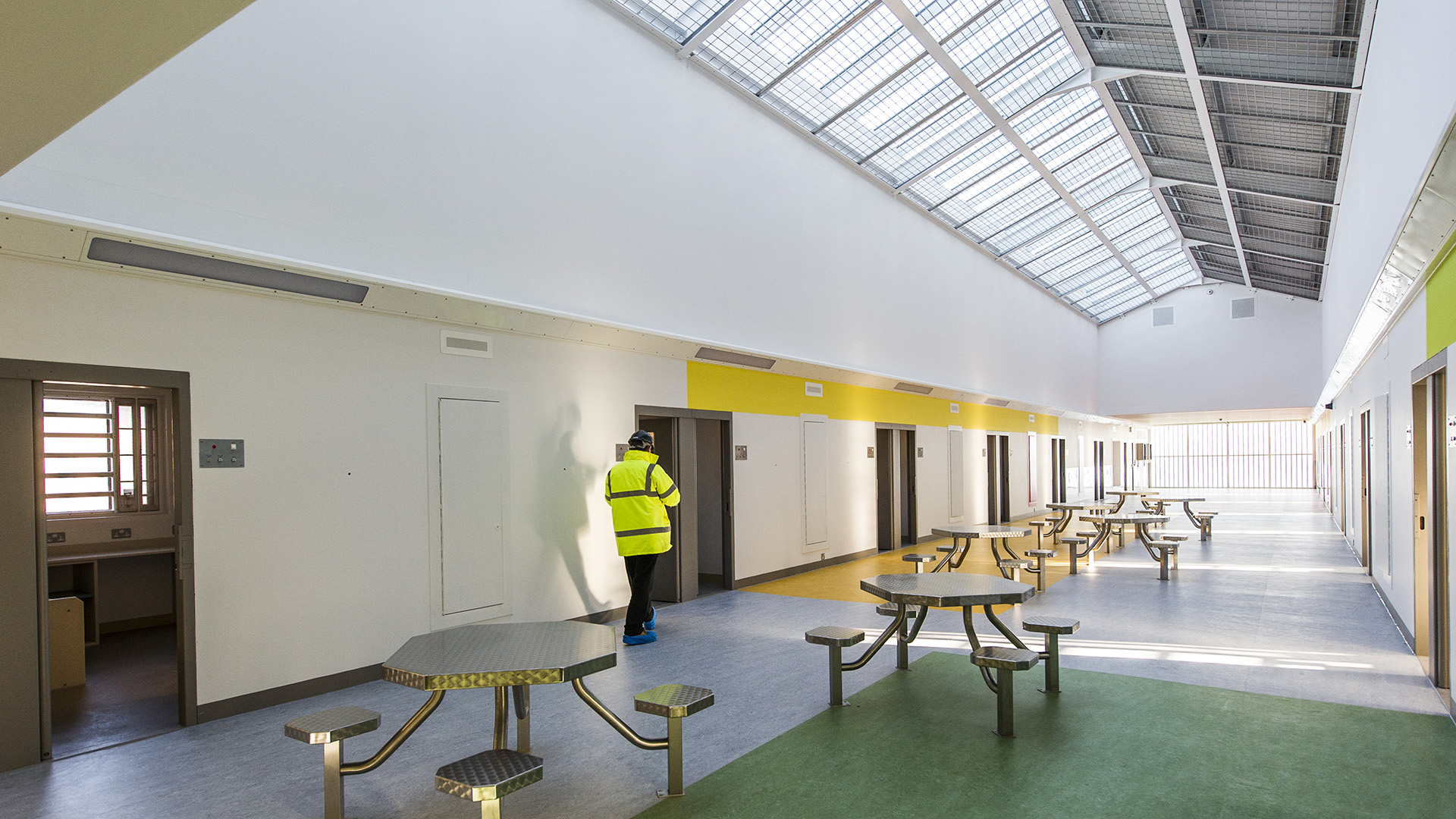 Light and bright communal space in a cell block at HMP Grampian
