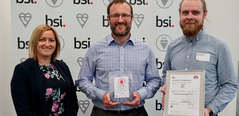Skanska UK's Director of Environment, Adam Crossley (centre) and Carbon Manager, Conor McCone (right) with BSI's UK Product Certification Director, Natasha Bambridge Skanska UK's Director of Environment, Adam Crossley (centre) and Carbon Manager, Conor McCone (right) with BSI's UK Product Certification Director, Natasha Bambridge