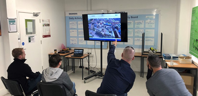 Attendees watching a presentation at the Blossom Street development in London