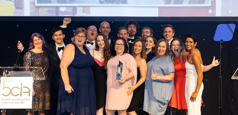The team celebrate winning a British Construction Industry Award for health, safety and wellbeing initiative of the year.