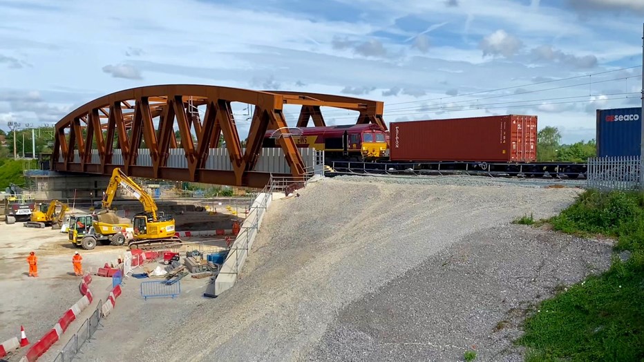 First train over SAS 13 bridge First train over SAS 13 bridge