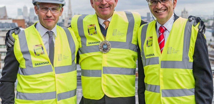 Andreas Lindelöf, Managing Director of Project Development, The Lord Mayor of the City of London, Alderman Alan Yarrow and Mike Putnam, Chief Executive and President of Skanska UK celebrate The Monument Building topping out.