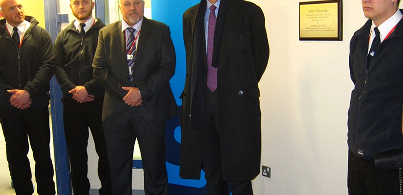 Andrew Selous MP, Minister for Prisons, Probation and Rehabilitation (centre) officially commissions the Skanska-built extension at Thameside prison, along with employees from the facility Andrew Selous MP, Minister for Prisons, Probation and Rehabilitation (centre) officially commissions the Skanska-built extension at Thameside prison, along with employees from the facility