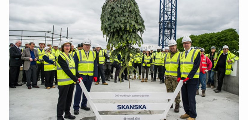Key stakeholders from the MOD and DIO celebrate the Worthy Down College Building topping out with Skanska MD Terry Elphick Key stakeholders from the MOD and DIO celebrate the Worthy Down College Building topping out with Skanska MD Terry Elphick