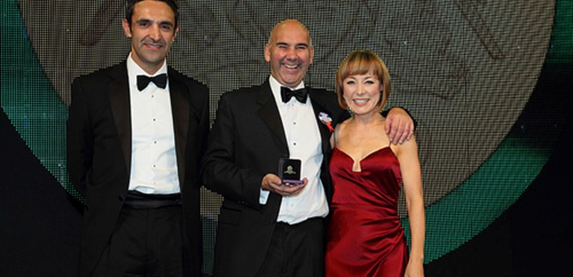 Steve collects his award Steve collects his award