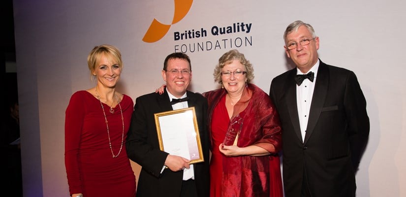 Award-winners: Steve Arkell and Kerry Ann Christelow are presented with the BQF award Award-winners: Steve Arkell and Kerry Ann Christelow are presented with the BQF award