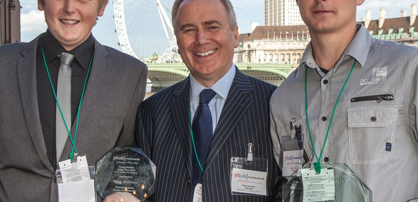 Paul Chandler (centre) with the two winners of Young Builder of the year 