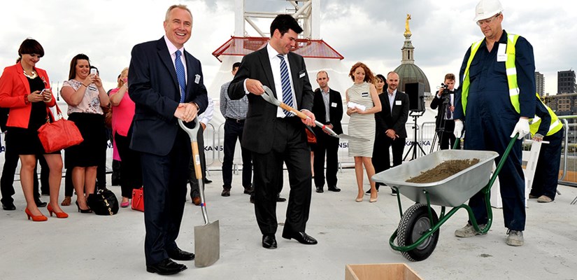 Skanska’s Executive Vice President Paul Chandler and Land Securities’ Head of Development Oliver Gardiner shovel the final piece of concrete into place. Skanska’s Executive Vice President Paul Chandler and Land Securities’ Head of Development Oliver Gardiner shovel the final piece of concrete into place.